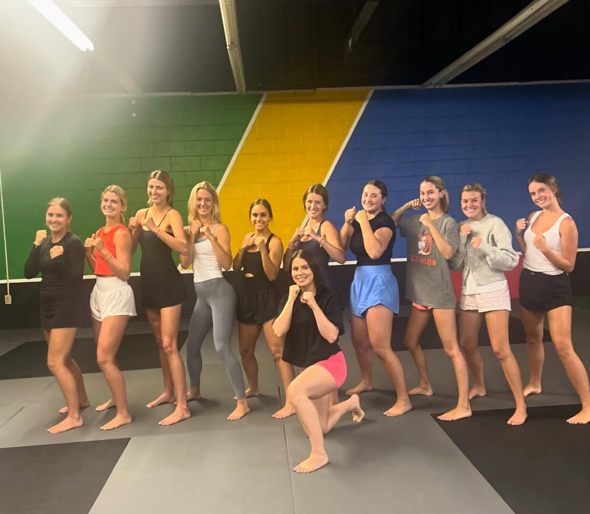 Coach Lexi with self defense class