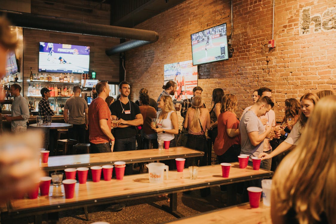 Fans watching soccer at a sports bar